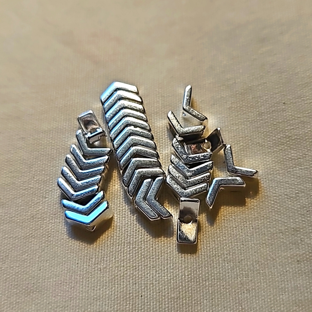 30 Silver Plated Hematite 6x5mm V Shaped Beads.